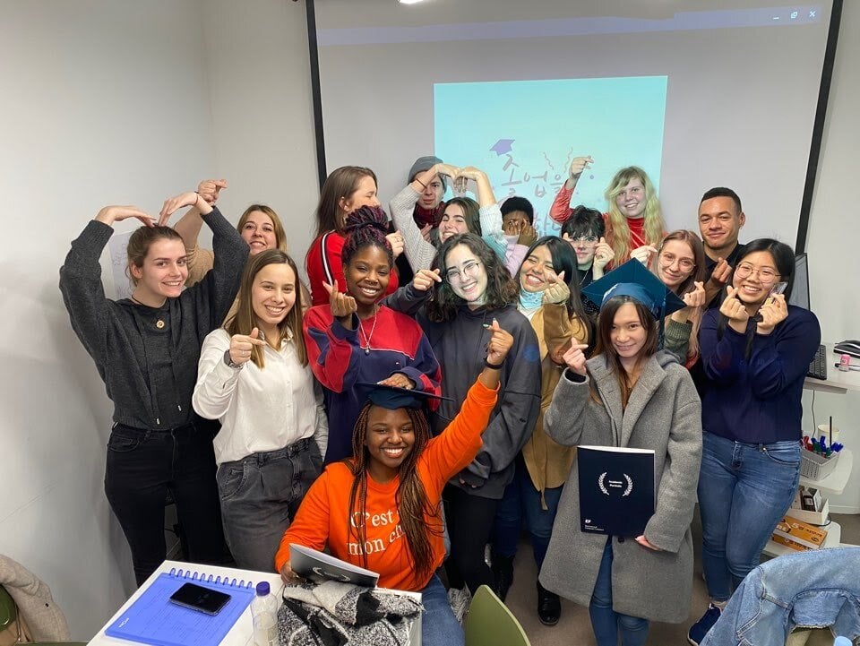 A group of exchange students posing together